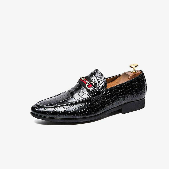 Lizard Print Slip-On Loafers.